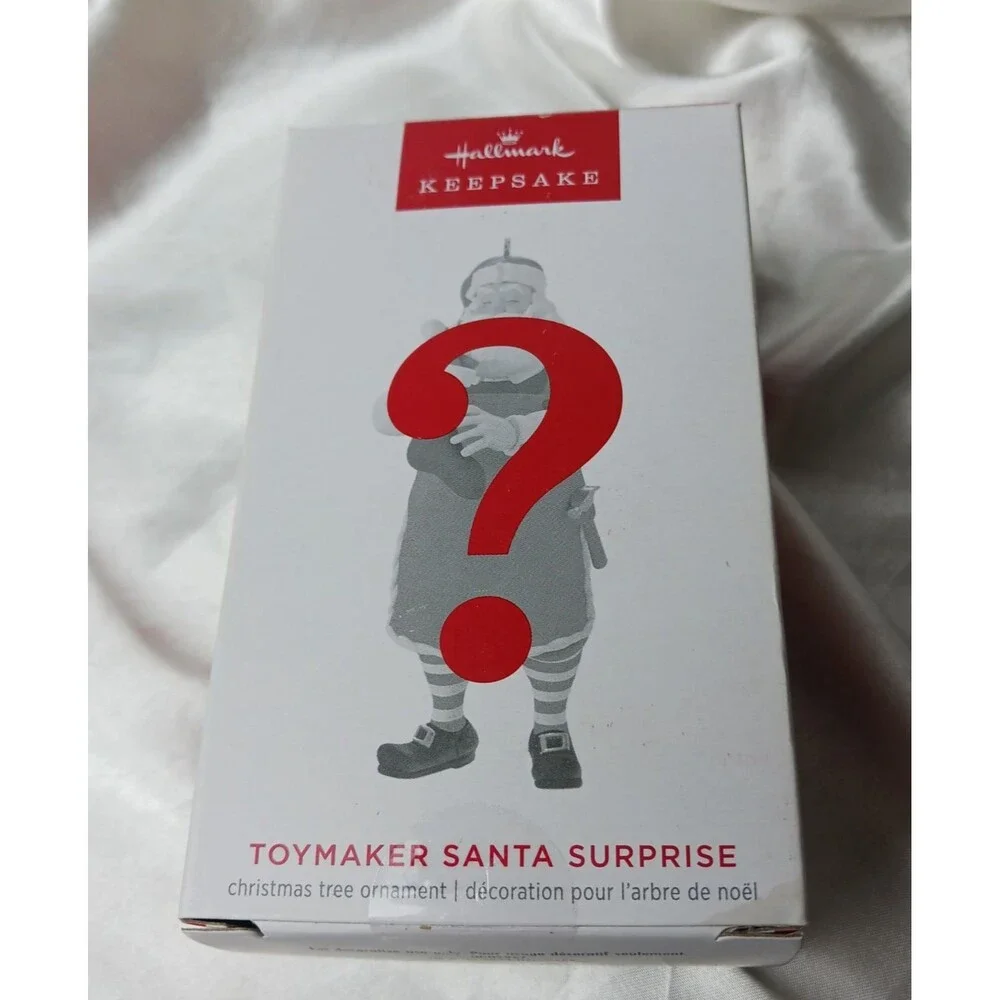 HALLMARK KEEPSAKE ORNAMENT  TOYMAKER SANTA SURPRISE COMMON BROWN